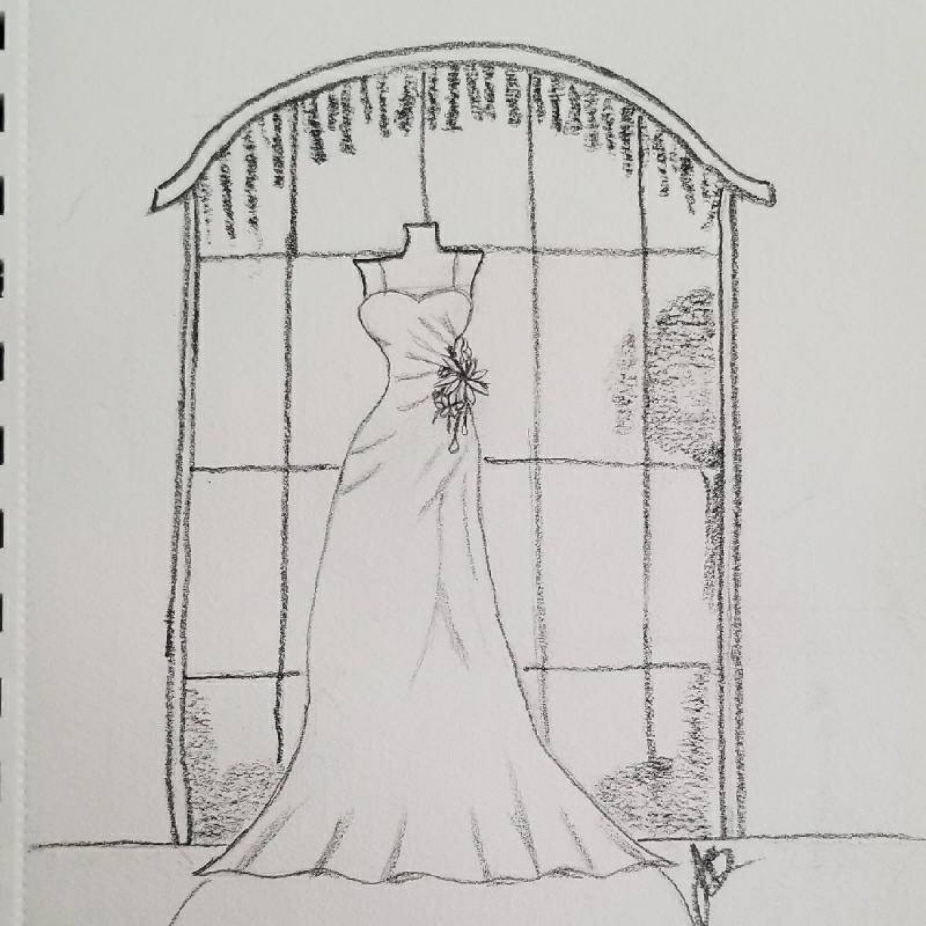 Wedding dress waiting by the garden w...